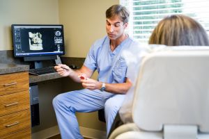 Dr. Maxwell talking to a patient