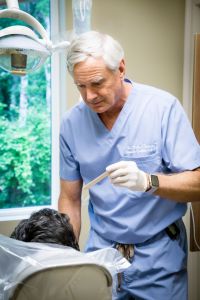 Dr. Harsha talking to a patient