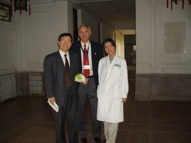 Dr. Harsha with two doctors in China